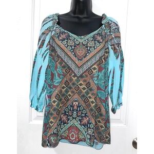 B.L.E.U. bohemian-style peasant blouse, featuring a vibrant, multi-color paisley